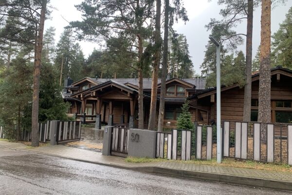 Colorful abstract painting with vibrant swirls and geometric shapes