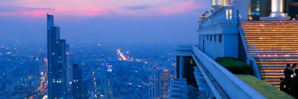 Close-up of vibrant yellow and orange sunflowers in a sunny field