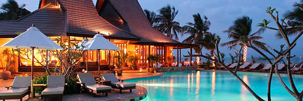 Beautiful beach sunset with vibrant colors reflecting on the ocean waves.